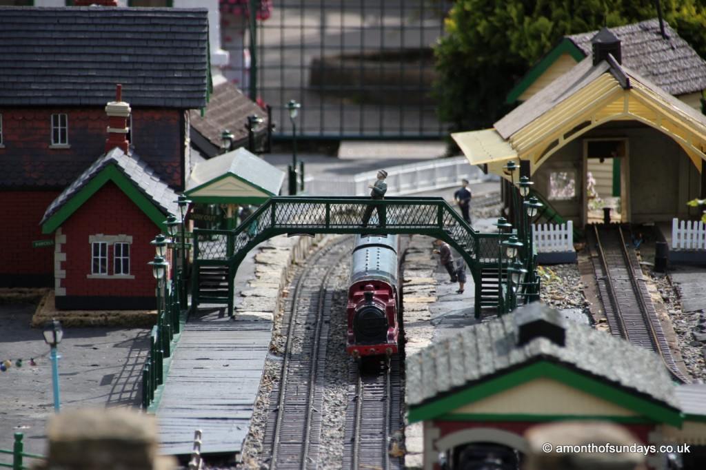 Train under bridge in platform