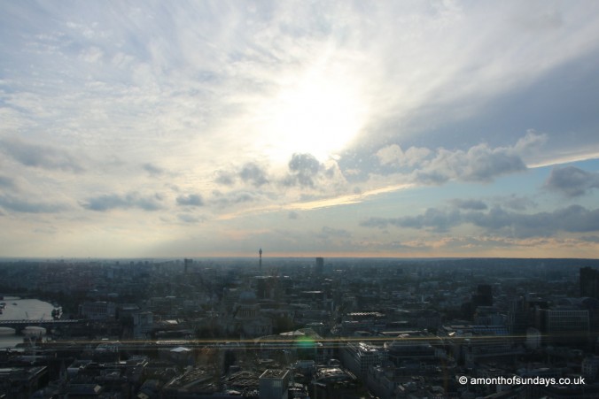 Sun setting over the city of London