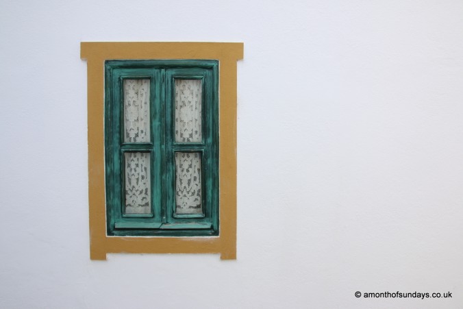 Painted window in Tavira