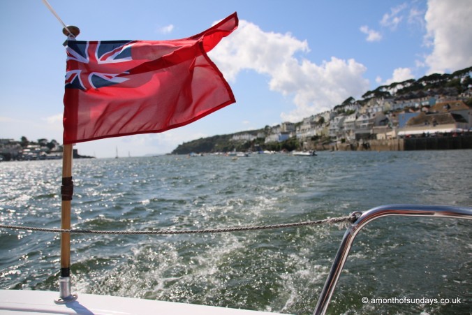 Flag flying from boat in Fowey