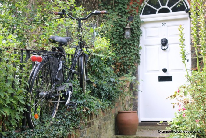 Bike next to front door in Hampstead